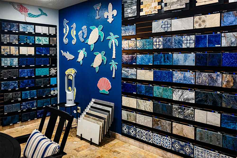 Pool tile and plaster showroom display featuring sample finishes by Superior Pool Plastering
